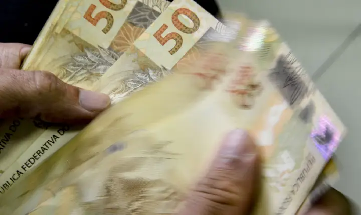 Caixa começa a pagar Bolsa Família de maio